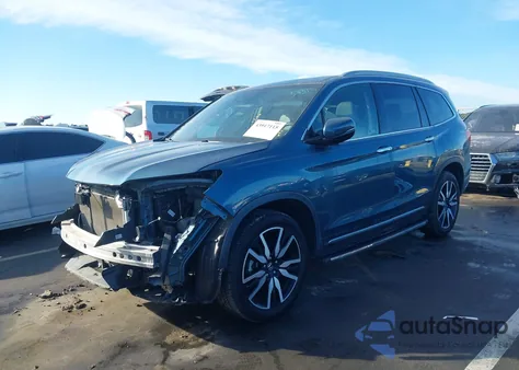 2020 Honda Pilot Awd Touring 7 Passenger z USA, uszkodzony, nr VIN 5FNYF6H6XLB022042